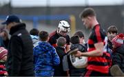 6 November 2022; Dessie Hutchinson of Ballygunner signs autographs for supporters after his side's victory in the AIB Munster GAA Hurling Senior Club Championship quarter-final match between Ballygunner and Kilruane MacDonagh's at Walsh Park in Waterford. Photo by Piaras Ó Mídheach/Sportsfile