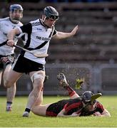 6 November 2022; Kevin Mahony of Ballygunner hits the ground after a tackle by Mark O'Neill of Kilruane MacDonagh's during the AIB Munster GAA Hurling Senior Club Championship quarter-final match between Ballygunner and Kilruane MacDonagh's at Walsh Park in Waterford. Photo by Piaras Ó Mídheach/Sportsfile
