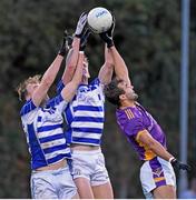 6 November 2022; Ben Shovlin of Kilmacud Crokes in action against Mark Maguire, left, and James Burke of Naas during the AIB Leinster GAA Football Senior Club Championship Quarter-Final match between Kilmacud Crokes and Naas at Parnell Park in Dublin. Photo by Daire Brennan/Sportsfile