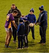 6 November 2022; Shane Walsh of Kilmacud Crokes with young supporters after the AIB Leinster GAA Football Senior Club Championship Quarter-Final match between Kilmacud Crokes and Naas at Parnell Park in Dublin. Photo by Daire Brennan/Sportsfile