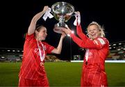 6 November 2022; Heather O'Reilly, left, and Emma Starr of Shelbourne celebrate with the EVOKE.ie FAI Women's Cup after the EVOKE.ie FAI Women's Cup Final match between Shelbourne and Athlone Town at Tallaght Stadium in Dublin. Photo by Stephen McCarthy/Sportsfile