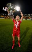 6 November 2022; Abbie Larkin of Shelbourne celebrates with the EVOKE.ie FAI Women's Cup after the EVOKE.ie FAI Women's Cup Final match between Shelbourne and Athlone Town at Tallaght Stadium in Dublin. Photo by Stephen McCarthy/Sportsfile