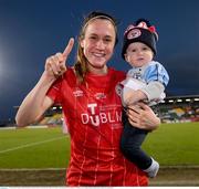 6 November 2022; Heather O'Reilly of Shelbourne celebrates with her son Jack after the EVOKE.ie FAI Women's Cup Final match between Shelbourne and Athlone Town at Tallaght Stadium in Dublin. Photo by Stephen McCarthy/Sportsfile