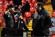 6 November 2022; Suspended Dundalk head coach Stephen O'Donnell, left, and Derry City manager Ruaidhrí Higgins during the SSE Airtricity League Premier Division match between Derry City and Dundalk at The Ryan McBride Brandywell Stadium in Derry. Photo by Ben McShane/Sportsfile