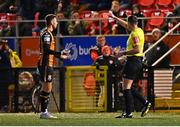 6 November 2022; Referee Rob Hennessy issues a red card to Robbie McCourt of Dundalk during the SSE Airtricity League Premier Division match between Derry City and Dundalk at The Ryan McBride Brandywell Stadium in Derry. Photo by Ben McShane/Sportsfile
