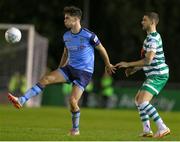 6 November 2022; John Haist of UCD in action against Lee Grace of Shamrock Rovers during the SSE Airtricity League Premier Division match between UCD and Shamrock Rovers at the UCD Bowl in Belfield, Dublin. Photo by Michael P Ryan/Sportsfile