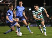 6 November 2022; Aaron Greene of Shamrock Rovers in action against Jamie Duggan of UCD during the SSE Airtricity League Premier Division match between UCD and Shamrock Rovers at the UCD Bowl in Belfield, Dublin. Photo by Michael P Ryan/Sportsfile