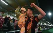 6 November 2022; Brian Gartland of Dundalk celebrates with his son Bobbie, age 3, after the SSE Airtricity League Premier Division match between Derry City and Dundalk at The Ryan McBride Brandywell Stadium in Derry. Photo by Ben McShane/Sportsfile