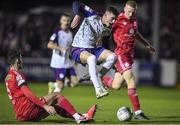 6 November 2022; Ben McCormack of St Patrick's Athletic is tackled by Shane Griffin of Shelbourne during the SSE Airtricity League Premier Division match between St Patrick's Athletic and Shelbourne at Richmond Park in Dublin. Photo by Tyler Miller/Sportsfile