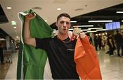 7 November 2022; Gold medallist Rhys McClenaghan of Ireland on his return from the World Artistic Gymnastics Championships 2022, at Dublin Airport in Dublin. Photo by David Fitzgerald/Sportsfile