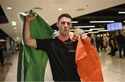 7 November 2022; Gold medallist Rhys McClenaghan of Ireland on his return from the World Artistic Gymnastics Championships 2022, at Dublin Airport in Dublin. Photo by David Fitzgerald/Sportsfile