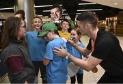7 November 2022; Gold medallist Rhys McClenaghan of Ireland signs autographs on his return from the World Artistic Gymnastics Championships 2022, at Dublin Airport in Dublin. Photo by David Fitzgerald/Sportsfile