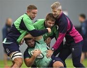 8 November 2022; Michael Milne is tackled by Scott Penny, Iain Henderson and defence coach Simon Easterby during Ireland rugby squad training at IRFU High Performance Centre at the Sport Ireland Campus in Dublin. Photo by Brendan Moran/Sportsfile