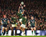 5 November 2022; Mack Hansen of Ireland and Cheslin Kolbe of South Africa contests a high ball during the Bank of Ireland Nations Series match between Ireland and South Africa at the Aviva Stadium in Dublin. Photo by Brendan Moran/Sportsfile