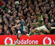 5 November 2022; Jonathan Sexton of Ireland kicks a conversion, under pressure from Cheslin Kolbe of South Africa during the Bank of Ireland Nations Series match between Ireland and South Africa at the Aviva Stadium in Dublin. Photo by Ramsey Cardy/Sportsfile
