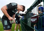 10 November 2022; Lee Barron signs autographs for supporters during the Leinster rugby open training session at Tullow RFC in Carlow. Photo by Sam Barnes/Sportsfile