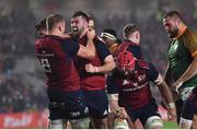10 November 2022; Munster players celebrate as Diarmuid Barron, hidden, scores their third try during the match between Munster and South Africa Select XV at Páirc Ui Chaoimh in Cork. Photo by David Fitzgerald/Sportsfile