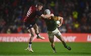 10 November 2022; Henco van Wyk of South Africa Select XV is tackled by Rory Scannell of Munster during the match between Munster and South Africa Select XV at Páirc Ui Chaoimh in Cork. Photo by David Fitzgerald/Sportsfile