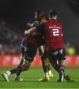 10 November 2022; Grant Williams of South Africa Select XV is tackled by Diarmuid Barron, right, and Kiran McDonald of Munster during the match between Munster and South Africa Select XV at Páirc Ui Chaoimh in Cork. Photo by David Fitzgerald/Sportsfile