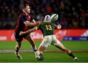 10 November 2022; Rory Scannell of Munster is tackled by Henco van Wyk of South Africa Select XV during the match between Munster and South Africa Select XV at Páirc Ui Chaoimh in Cork. Photo by Harry Murphy/Sportsfile