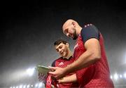 10 November 2022; Antoine Frisch and Kiran McDonald of Munster look at the shield after their side's victory in the match between Munster and South Africa Select XV at Páirc Ui Chaoimh in Cork. Photo by Harry Murphy/Sportsfile