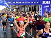 30 October 2022; Runners including  Donna McGrath from Dublin 2, left, compete in the 2022 Irish Life Dublin Marathon. 25,000 runners took to the Fitzwilliam Square start line to participate in the 41st running of the Dublin Marathon after a two-year absence. Photo by Sam Barnes/Sportsfile