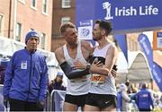 30 October 2022; Paul Doran from United Striders AC, left, and Ian Fitzgerald from Dublin 8, celebrate finishing the 2022 Irish Life Dublin Marathon. 25,000 runners took to the Fitzwilliam Square start line to participate in the 41st running of the Dublin Marathon after a two-year absence. Photo by Sam Barnes/Sportsfile