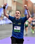 30 October 2022; Adrian Igoe from LSA AC celebrates finishing the 2022 Irish Life Dublin Marathon. 25,000 runners took to the Fitzwilliam Square start line to participate in the 41st running of the Dublin Marathon after a two-year absence. Photo by Sam Barnes/Sportsfile