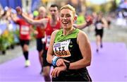 30 October 2022; Liz Shouldice from Dublin celebrates finishing the 2022 Irish Life Dublin Marathon. 25,000 runners took to the Fitzwilliam Square start line to participate in the 41st running of the Dublin Marathon after a two-year absence. Photo by Sam Barnes/Sportsfile