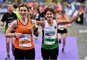 30 October 2022; Breeda Sheedy from Midleton AC, right, celebrates finishing the 2022 Irish Life Dublin Marathon. 25,000 runners took to the Fitzwilliam Square start line to participate in the 41st running of the Dublin Marathon after a two-year absence. Photo by Sam Barnes/Sportsfile