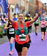 30 October 2022; Kara Tedford from Dublin celebrates finishing the 2022 Irish Life Dublin Marathon. 25,000 runners took to the Fitzwilliam Square start line to participate in the 41st running of the Dublin Marathon after a two-year absence. Photo by Sam Barnes/Sportsfile