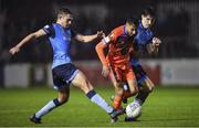 11 November 2022; Yassine En-Neyah of Waterford in action against Evan Caffrey, left, and Dara Keane of UCD during the SSE Airtricity League Promotion / Relegation Play-off match between UCD and Waterford at Richmond Park in Dublin. Photo by Tyler Miller/Sportsfile