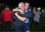 11 November 2022; Jack Keaney of UCD celebrates with a supporter after his side's victory in the SSE Airtricity League Promotion / Relegation Play-off match between UCD and Waterford at Richmond Park in Dublin. Photo by Tyler Miller/Sportsfile
