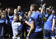 11 November 2022; UCD players and supporters celebrate together after their side's victory in the SSE Airtricity League Promotion / Relegation Play-off match between UCD and Waterford at Richmond Park in Dublin. Photo by Tyler Miller/Sportsfile