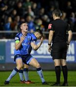 11 November 2022; Jack Keaney of UCD reacts in front of referee Rob Harvey after a penalty is awarded against his side during the SSE Airtricity League Promotion / Relegation Play-off match between UCD and Waterford at Richmond Park in Dublin. Photo by Seb Daly/Sportsfile