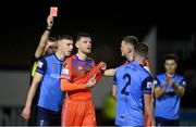 11 November 2022; Killian Cantwell of Waterford is shown a red card by referee Rob Harvey during the SSE Airtricity League Promotion / Relegation Play-off match between UCD and Waterford at Richmond Park in Dublin. Photo by Seb Daly/Sportsfile