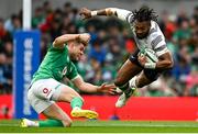 12 November 2022; Waisea Nayacalevu of Fiji evades the tackle of Garry Ringrose of Ireland during the Bank of Ireland Nations Series match between Ireland and Fiji at the Aviva Stadium in Dublin. Photo by Harry Murphy/Sportsfile