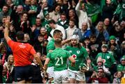 12 November 2022; Mack Hansen of Ireland celebrates with Max Deegan and Craig Casey after scoring his side's fourth try during the Bank of Ireland Nations Series match between Ireland and Fiji at the Aviva Stadium in Dublin. Photo by Harry Murphy/Sportsfile