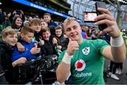 12 November 2022; Craig Casey of Ireland takes a selfie with young supporters after the Bank of Ireland Nations Series match between Ireland and Fiji at the Aviva Stadium in Dublin. Photo by Brendan Moran/Sportsfile