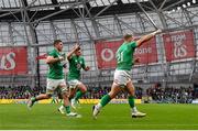 12 November 2022; Craig Casey, right, and Jack Crowley of Ireland, centre, celebrate their side's fourth try, scored by teammate Mack Hansen, not pictured, during the Bank of Ireland Nations Series match between Ireland and Fiji at the Aviva Stadium in Dublin. Photo by Seb Daly/Sportsfile