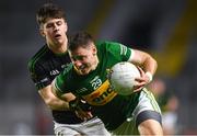 12 November 2022; Ciaran Cannon of Clonmel Commercials in action against Luke Horgan of Nemo Rangers during the AIB Munster GAA Football Senior Club Championship Quarter-Final match between Nemo Rangers and Clonmel Commercials at Páirc Uí Chaoimh in Cork. Photo by Matt Browne/Sportsfile