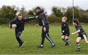 13 November 2022; Leinster Rugby players Nick McCarthy, left, and Ross Byrne during a Dundalk RFC Minis training session at Dundalk RFC in Dundalk, Louth. Photo by Ramsey Cardy/Sportsfile