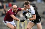 13 November 2022; Ryan McEvoy of Kilcoo in action against Ciaran Galligan of Ballybay Pearses during the AIB Ulster GAA Football Senior Club Championship Quarter-Final match between Kilcoo and Ballybay Pearse Brothers at St Tiernach's Park in Clones, Monaghan. Photo by Brendan Moran/Sportsfile