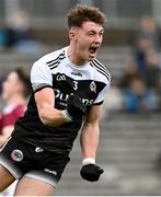 13 November 2022; Ryan McEvoy of Kilcoo celebrates after scoring a point during the AIB Ulster GAA Football Senior Club Championship Quarter-Final match between Kilcoo and Ballybay Pearse Brothers at St Tiernach's Park in Clones, Monaghan. Photo by Brendan Moran/Sportsfile