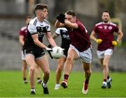 13 November 2022; Anthony Morgan of Kilcoo in action against Michael Hannon of Ballybay Pearses during the AIB Ulster GAA Football Senior Club Championship Quarter-Final match between Kilcoo and Ballybay Pearse Brothers at St Tiernach's Park in Clones, Monaghan. Photo by Brendan Moran/Sportsfile