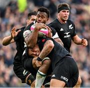 13 November 2022; Lekima Tagitagivalu of Barbarians is tackled by Tamaiti Williams of All Blacks XV during the Killik Cup match between Barbarians and All Blacks XV at Tottenham Hotspur Stadium in London, England. Photo by Ramsey Cardy/Sportsfile