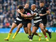 13 November 2022; Leicester Fainga'anuku of All Blacks XV is tackled by Dillyn Leyds, left, and Teddy Thomas of Barbarians during the Killik Cup match between Barbarians and All Blacks XV at Tottenham Hotspur Stadium in London, England. Photo by Ramsey Cardy/Sportsfile