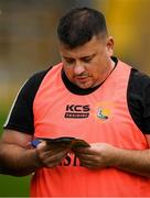 13 November 2022; Castletown Geoghegan manager Alan &quot;Budda&quot; Mangan reads his match programme before the AIB Leinster GAA Hurling Senior Club Championship Quarter-Final match between Shamrocks Ballyhale and Castletown Geoghegan at UPMC Nowlan Park in Kilkenny. Photo by Ray McManus/Sportsfile