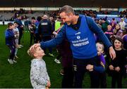 13 November 2022; Kilmacud Crokes manager Donal McGovern celebrates with his son Seán, aged 6, right, and his nephew, Dillon McGovern, aged 5, after his side's victory in the AIB Leinster GAA Hurling Senior Club Championship Quarter-Final match between Kilmacud Crokes and Clough/Ballacolla at Parnell Park in Dublin. Photo by Sam Barnes/Sportsfile