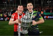 13 November 2022; Cameron McJannet, left, and Derry City goalkeeper Brian Maher celebrate with the FAI Senior Challenge Cup after their side's victory in the Extra.ie FAI Cup Final match between Derry City and Shelbourne at Aviva Stadium in Dublin. Photo by Stephen McCarthy/Sportsfile